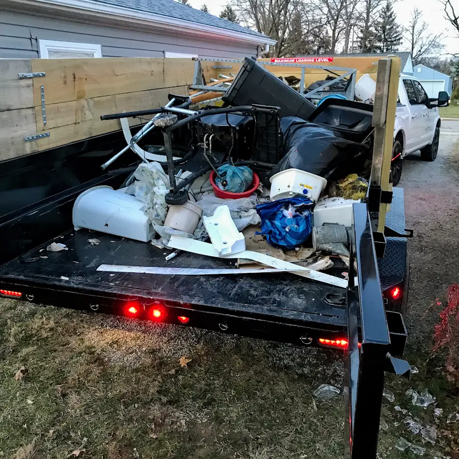 Roll-off dumpster delivered to a residential driveway in Seymour